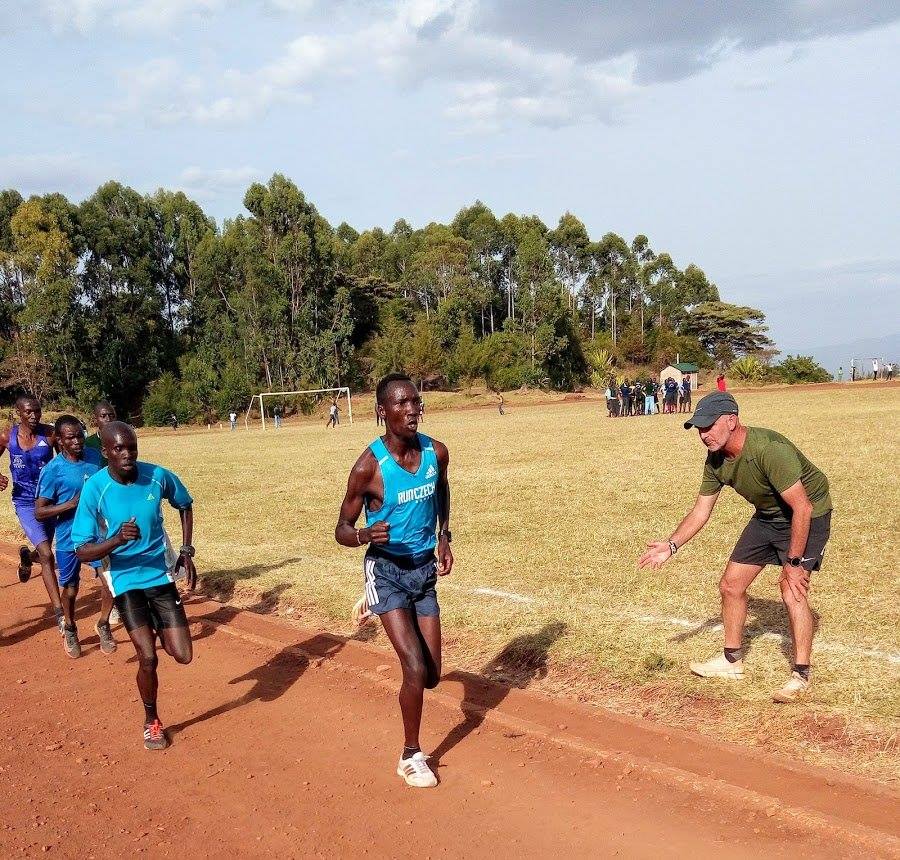 Coach Stazza coaching his Kenyan athletes at the dusty Tambach Track